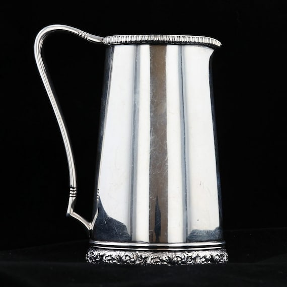 CTW Home Tall Metal Pitcher with Floral Design