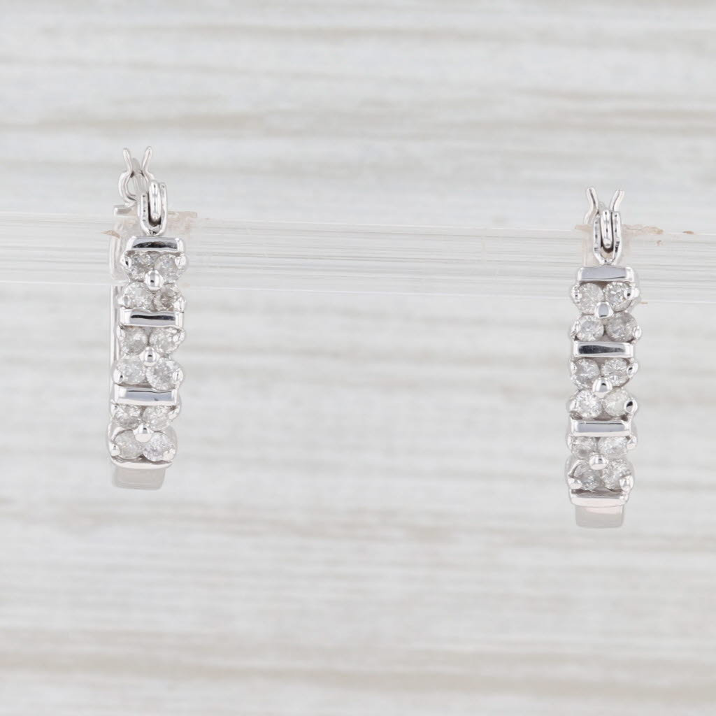 0.67 in x 0.2 in 14K White Gold Diamond-cut Polished Oval Hoop Earring 0.67 in x 0.2 in 14K White Gold Diamond-cut Polished Oval Hoop Earring