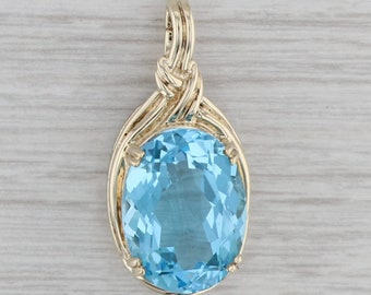 7.40ct Oval Blue Topaz Enhancer Pendant 10k Yellow Gold Clip Bail