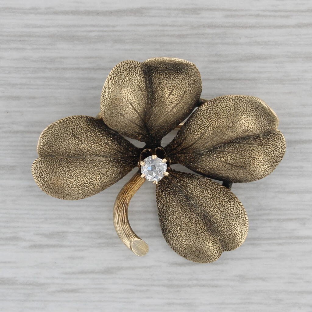 Gold store shamrock brooch