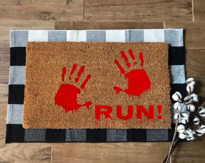 Hand-painted Bloody hand prints Halloween doormat