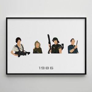 May include: A black and white framed print featuring four characters from the 1986 film Aliens. The characters are Ripley, Newt, Hicks, and Burke. The print includes the year 1986.