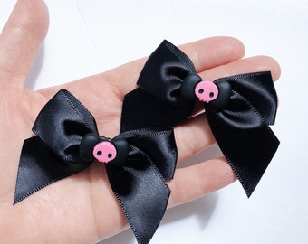 Lazos de coleta para Halloween: pinzas negras para el cabello con un fantasma rosa