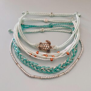 Beach Bracelet Set Summer Style Collection Adjustable String Design Ocean Theme Jewelry Turquoise Braided Cord Multi Strand Pattern Turtle Charm Accent Glass Bead Details Boho Fashion Essential Perfect Vacation Wear Beautiful Coastal