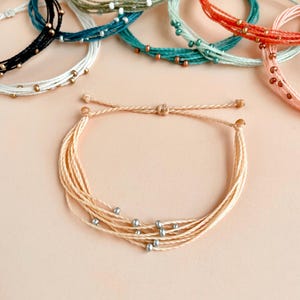 String Bracelet with Beads Surfer Bead Bracelet for Women Beachy Boho Bracelet Cord Adjustable Pull String Bracelet Waxed Cord Bracelet Set