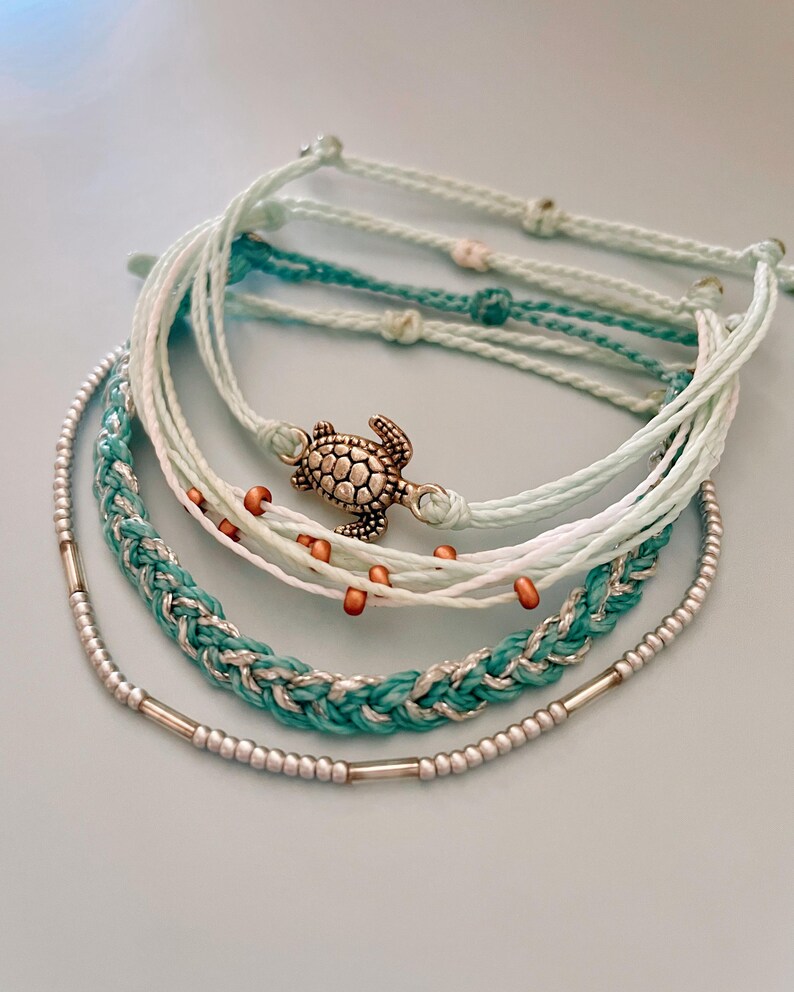 Summer Style Set Beach Bracelet Collection Ocean Theme Design Adjustable String Pattern Turquoise Multi Strand Details Glass Bead Accent Turtle Charm Feature Perfect Vacation Essential Beautiful Fashion Wear Coastal Collection