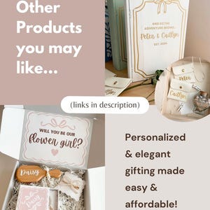 May include: A white gift box containing a wooden hairbrush with the name Daisy, a small box with a pink label, and a pearl hair clip. The box lid features the text Will You Be Our Flower Girl? with a pink heart and a decorative border design.