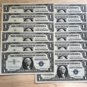 Thirteen (13) - 1957 One Dollar Silver Certificates (Consecutive) - Uncirculated