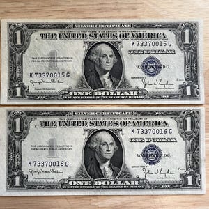 Two (2) - 1935 One Dollar Silver Certificates (Consecutive Pair) - Uncirculated