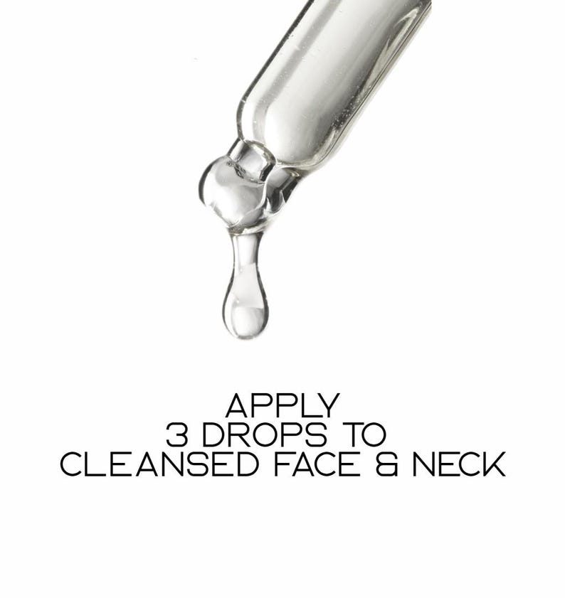 May include: A close-up of a clear glass dropper dispensing a single drop of liquid. The text below reads: APPLY 3 DROPS TO CLEANSED FACE & NECK.