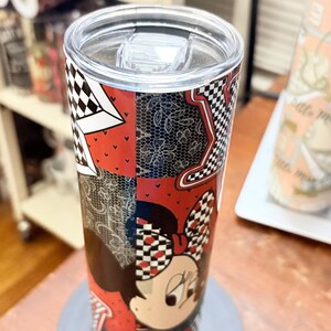 May include: A set of three ceramic mugs with a speckled, matte finish. The mugs are in shades of cream, light gray, and dark gray. Each mug has a simple, minimalist design and a rounded handle.