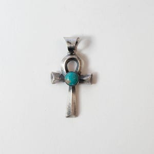 Turquoise cross pendant