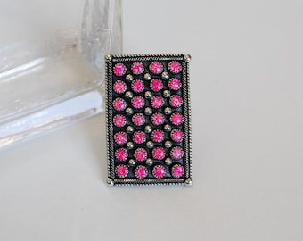 Pink Opal ring with adjustable band. Artist: Myron Etsitty