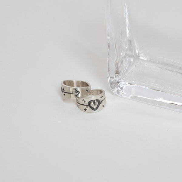 Sterling silver ring size, 8  Artist: Dereck Cadman