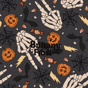 May include: A seamless pattern featuring a spooky Halloween theme with black bats, orange pumpkins with spooky faces, candy corn, spiderwebs, lightning bolts, and white skeleton hands. The text "Brittany Frost Designs" is included in the pattern.