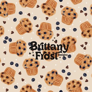 May include: A seamless pattern featuring blueberry muffins with chocolate chips on a light beige background. The pattern includes blueberries and chocolate chips scattered throughout. The text "Brittany Frost designs" is centered on the pattern.