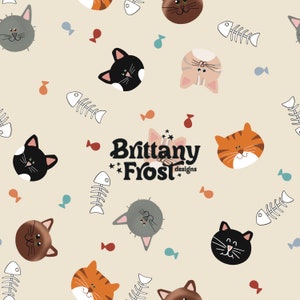 May include: A seamless pattern featuring various cartoon cats in different colours and poses, including black, grey, orange, and brown. The background is a light beige colour, and the pattern includes small details like fish bones and red hearts. The text "Brittany Frost designs" is also included in the pattern.