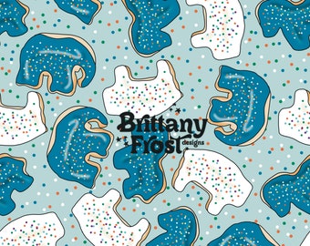 May include: A seamless pattern featuring blue and white sugar cookies shaped like bears. The cookies are decorated with colorful sprinkles. The background is a light blue with white and green polka dots. The text "Brittany Frost designs" is in the center of the pattern.