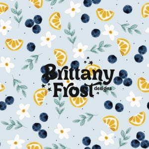May include: A light blue seamless pattern with illustrations of blueberries, lemon slices, white flowers, and green leaves. The text "Brittany Frost designs" is in the center of the image.