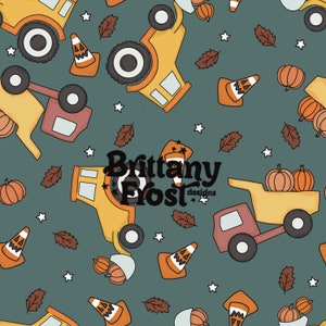 May include: A seamless pattern featuring yellow dumper trucks, orange traffic cones, and orange pumpkins on a teal background. The pattern also includes small white stars, brown leaves, and the text "Brittany Frost designs".