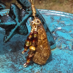 Flashy bronzite with tiger eye/crystal/glass bead dangles on a gold plated necklace