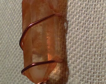 Joyful Tangerine Quartz point and black leather necklace.