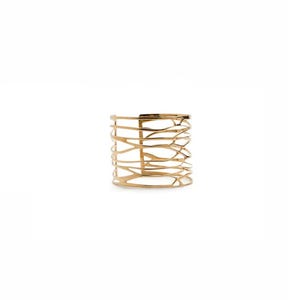 Nature-inspired cuff bracelet in polished brass, a distinctive piece for women who appreciate refined, statement jewelry.