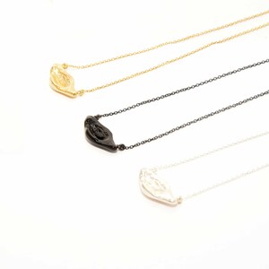 Aura necklace a handcrafted organic masterpiece in polished silver, gold, and black plated. Unique, contemporary, and perfect for every day.