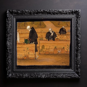 May include: A framed artwork depicts skeletal figures tending a garden. The figures, dressed in black robes, are watering plants and tending to the garden beds. The artwork is framed in a black, ornate frame, creating a gothic aesthetic.