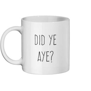 May include: White ceramic mug with a curved handle. The mug features the text "DID YE AYE?" in black, centered on the front. The design is simple and the mug is set against a white background.