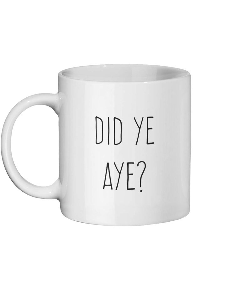 May include: White ceramic mug with a curved handle. The mug features the text "DID YE AYE?" in black, centered on the front. The design is simple and the mug is set against a white background.