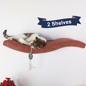 Il sogno di ogni amante dei gatti: set di 2 trespoli galleggianti con cuscini rimovibili, eleganti complementi d'arredo da parete.