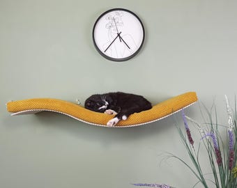 Elevate Your Cat's Nap Game with this Stylish Floating Bed - Washable Cushion Included