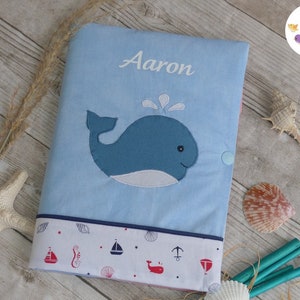 Protege el libro de salud de ballenas, mares, océanos y peces.