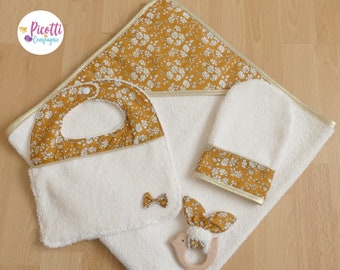 Liberty birth box, bath cape + washcloth + bib + teething ring