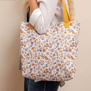 Delicate mustard and purple floral tote bag for flower lovers
