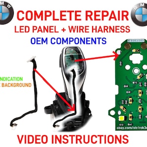 Op de afbeelding: Afbeelding van een BMW auto-onderdelenreparatieset. De afbeelding bevat een versnellingspook, een groene printplaat met LED-verlichting en bedrading. Tekst op de afbeelding luidt "COMPLETE REPAIR LED PANEL + WIRE HARNESS OEM COMPONENTS" en "VIDEO INSTRUCTIONS".