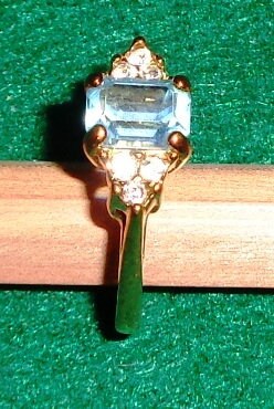 Topaz blue like stone with diamond like stones gold ring 1970s Womans ring