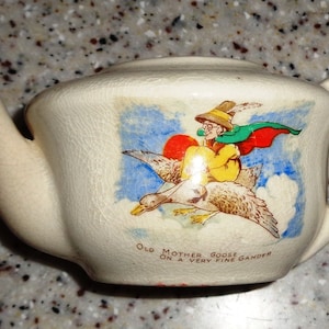Mother Goose antique tea pot. Estate sale find.