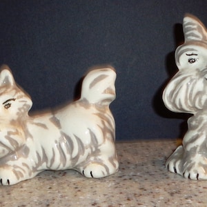 Two dog figurines.