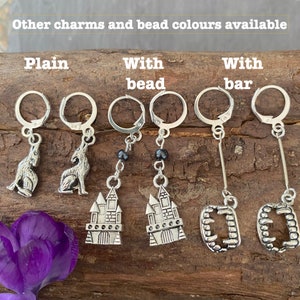 Bram Stoker&#39;s Dracula lever back huggie earrings with the charm and design of your choice.