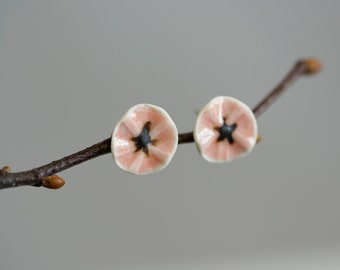 DELICATE FLOWER - Porcelain stud earrings, handmade, glazed in pink with black star in the middle, sea urchin, natural and elegant