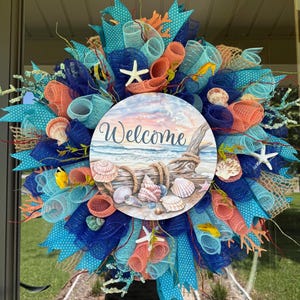 Beach Theme Mesh Wreath 24”  Blue/Aqua/Coral colored mesh