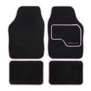 May include: Set of four black car floor mats with pink edging. The driver's side mat has a pink rectangle with the text "Beth's Car" embroidered in pink.
