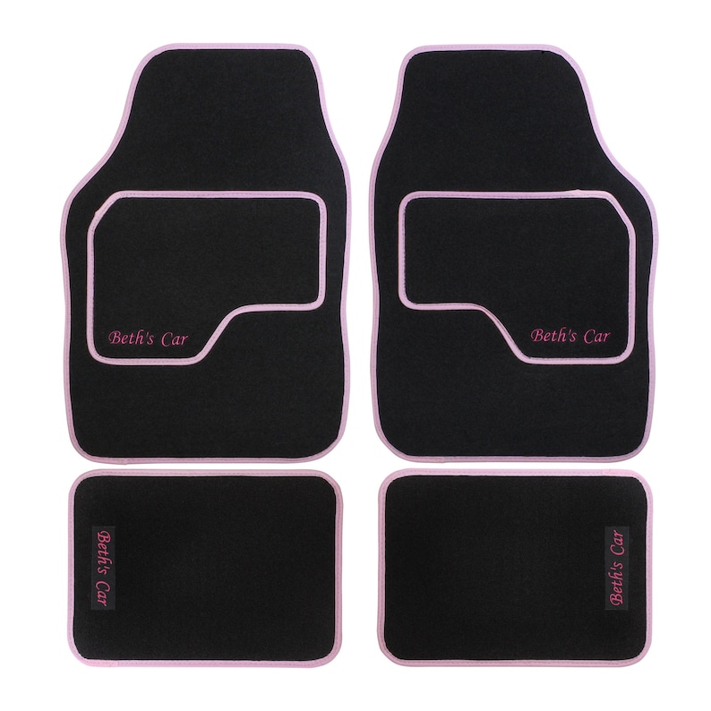 May include: Set of four black car floor mats with pink edging and the text "Beth's Car" embroidered in pink.
