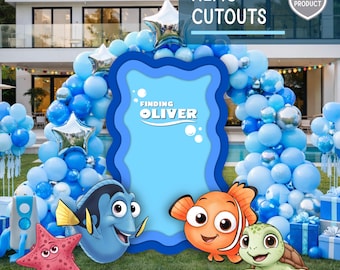May include: A party decoration set featuring a blue arch of balloons, a large blue cutout with the text "Finding Oliver", and character cutouts from the movie "Finding Nemo". The set includes a starfish, Dory, Nemo, and a turtle.