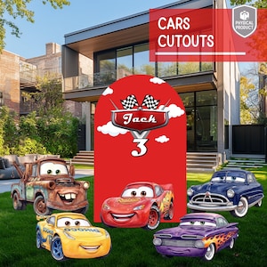May include: A collection of Cars cutout decorations, including Mater, Lightning McQueen, and other character cutouts. A red archway with the text "Cars Cutouts" and a personalized banner that reads "Jack 3" is also included. The cutouts are displayed on a green lawn.