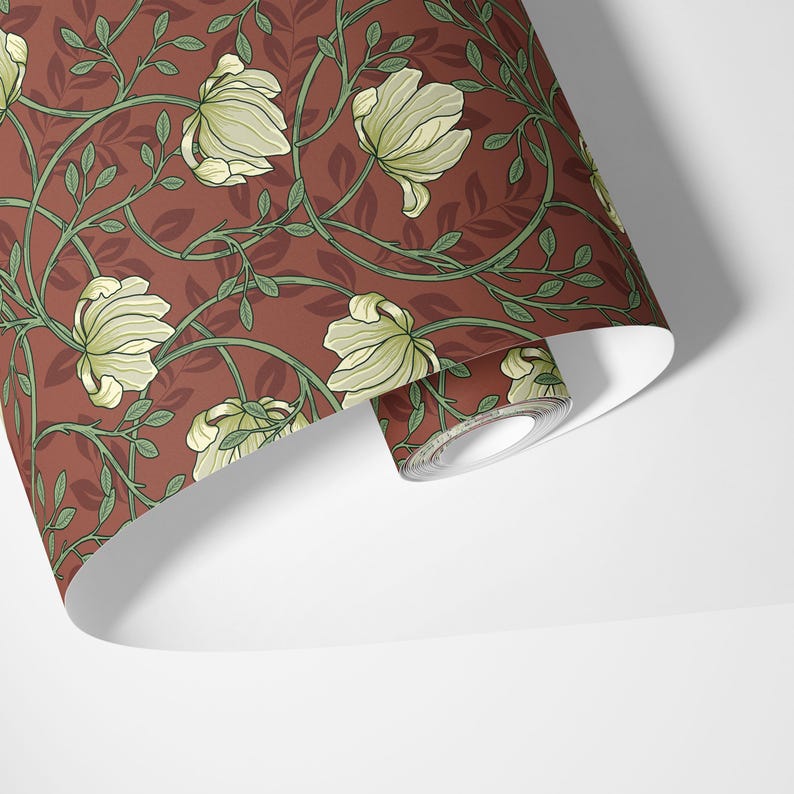 May include: A roll of wallpaper with a repeating pattern of white flowers and green leaves on a red background.