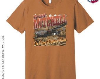 May include: A brown t-shirt with a vintage-style graphic of a B-25 Mitchell bomber plane. The graphic includes the text "B-25 MITCHELL" and "On Every Fighting Front".