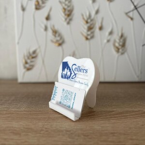 White  acrylic tooth wish logo